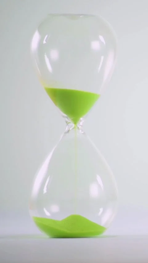 Green Sand Timer Representing Votes for Sustainability and the Urgency of Climat Stock Footage 282665539