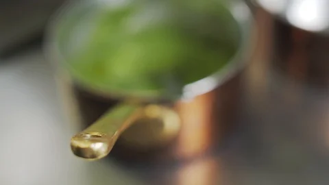 Green sauce or mashed in a saucepan. Kitchen in the restaurant or cafe. High Stock Footage 88673002