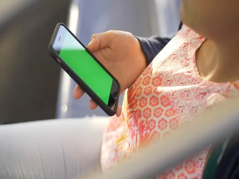 Green Sceen iphone on a subway train Stock Footage 80914290