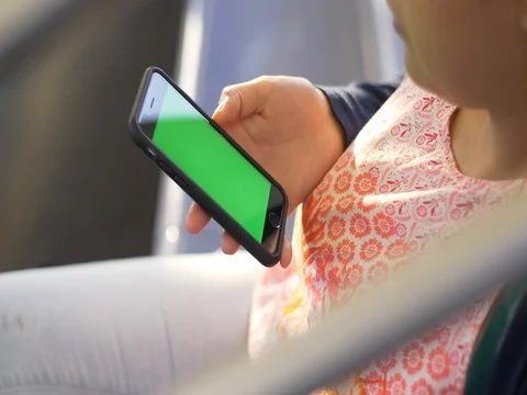 Green Sceen iphone on a subway train Stock Footage 80914356