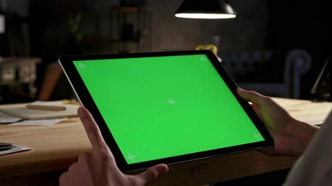 Green Screen and Chroma Key of Tablet Computer. Business Man Holding Mobile PC a Video stock 199481109