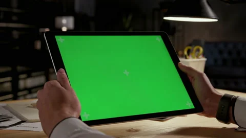 Green Screen and Chroma Key of Tablet Computer. Business Man Holding Mobile PC C Stock Footage 199481127