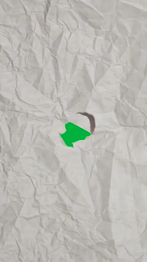 A green screen animation of paper crumpling up and being shredded. Stock Footage 306846879
