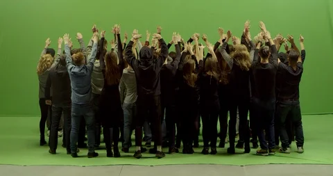 GREEN SCREEN Back view of huge crowd clapping and cheering at a concert or show Video stock 125636004