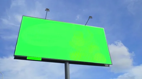 Green screen. Billboard over blue sky with clouds. Timelapse Stock Footage 133571997