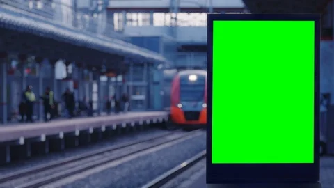 Green screen blank billboard on a train station against subway train Stock-Footage 118810565