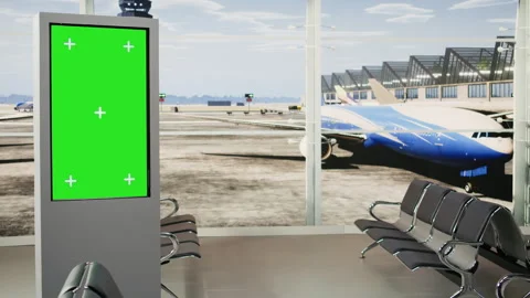 Green screen board in empty airport terminal with runway shown on big windows Stock Footage 343736339