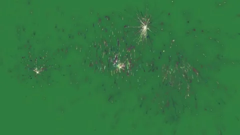 A green screen with bunch of fireworks on it and an image lots small objects Video stock 335122280