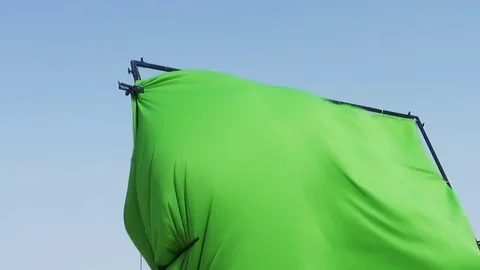 Green screen butterfly flapping in strong wind in the sun Stock-Footage 76935922