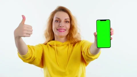 Green screen in camera focus, advertising, chroma key, OK gesture and woman with Stock Footage 247458513