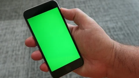 Green screen on cell phone face. Stock Footage 112852657