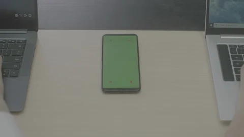 Green screen of cellphone on the table Stock Footage 119576520