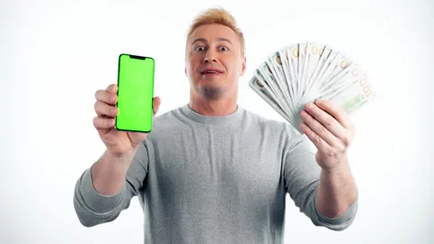 Green screen, chroma key, dollars, money cash and man with phone for product pla Stock Footage 246428321