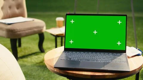 Green screen for chroma key editing with screen replacement on laptop Stock Photos