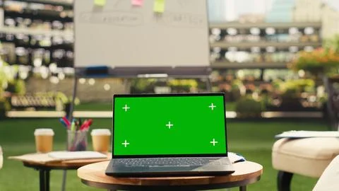 Green screen for chroma key editing with screen replacement on laptop Stock Photos