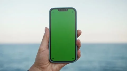 Green Screen chroma key Handheld Smartphone. Travel with phone concept Stock Footage 206434628