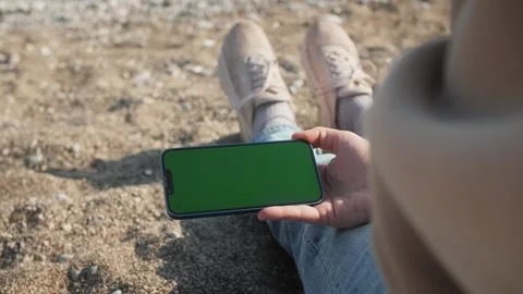 Green Screen chroma key Handheld Smartphone. Travel with phone concept Stock Footage 247138297