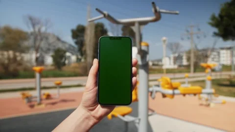 Green Screen chroma key Handheld Smartphone. Travel with phone concept Stock Footage 263085029