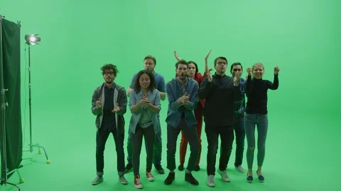 Green Screen Chroma Key Studio: Crowd of Multi-Ethnic Fans Cheering, Screaming Stock Footage 129402311