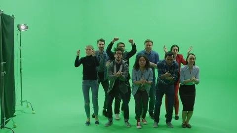 Green Screen Chroma Key Studio: Diverse Crowd of Multi-Ethnic Fans Cheering Stock Footage 129402573