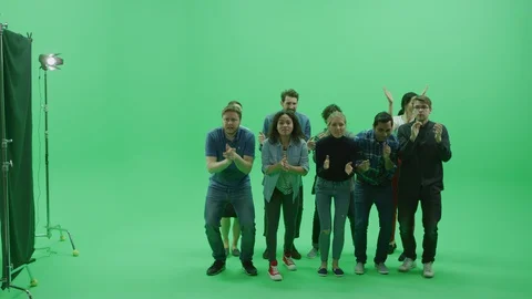 Green Screen Chroma Key Studio: Diverse Crowd of Multi-Ethnic Fans Cheering Stock Footage 129405042