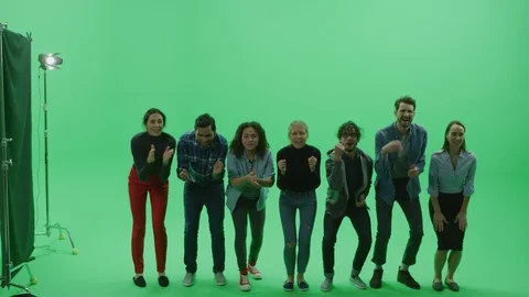 Green Screen Chroma Key Studio: Diverse Crowd of Multi-Ethnic People Cheering Stock Footage 129405419