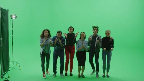 Green Screen Chroma Key Studio: Diverse Crowd of Multi-Ethnic People Cheering Stock Footage 129405470
