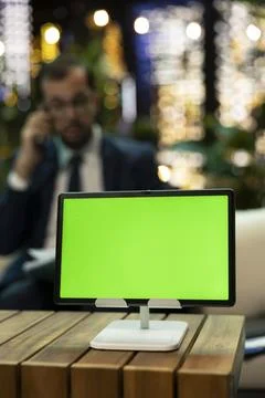 Green screen chroma key on tablet with business professional Foto stock