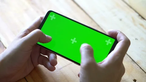 Green screen chroma key on tablet,women working or using tablet in coffee shop. Stock Footage 96183783