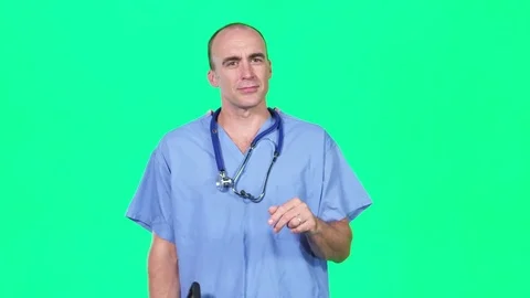 Green screen chromakey of doctor using digital tablet and HUD Video stock 80012351