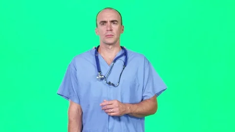 Green screen chromakey of doctor using digital tablet and HUD Stock Footage 80012368