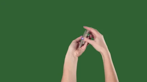 Green screen. Chromakey. Women's hands interfere with a deck of cards and throw Stock Footage 106132407