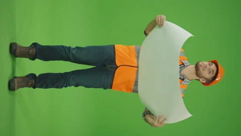 Green Screen. Civil Engineer , Expanding the Blueprint and Taking a Look Smiling Stock Footage 224787247