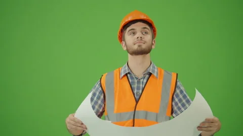 Green Screen. Civil Engineer , Expanding the Blueprint and Taking a Look Smiling Stock Footage 224787329