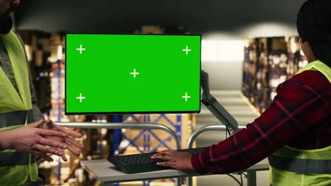 Green screen computer desktop, two workers team, distribution center Stock Footage 330206391