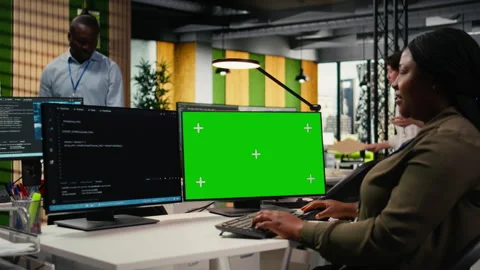 Green screen computer used by admin in office doing software development Stock Footage 323332633