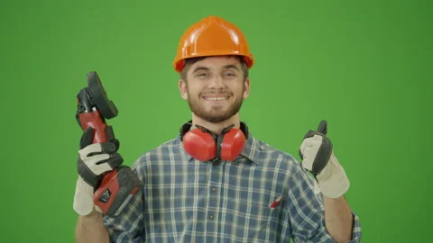 Green Screen. Confident Civil Engineer ,Lifting the Circular Saw Up, Making OK Stock Footage 224785979