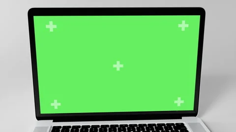 Green Screen Display Laptop Opens and Zoom In on a White Background. Empty Green Stock Footage 231494887