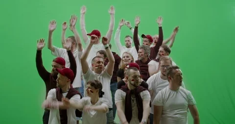 GREEN SCREEN Front view group of people fans doing a wave Stock Footage 110384729