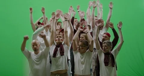GREEN SCREEN Front view group of people fans doing a wave Stock Footage 110395503