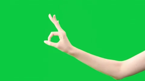 Green screen with hand forming a peace sign ideal for videos. Stock Footage 306771092