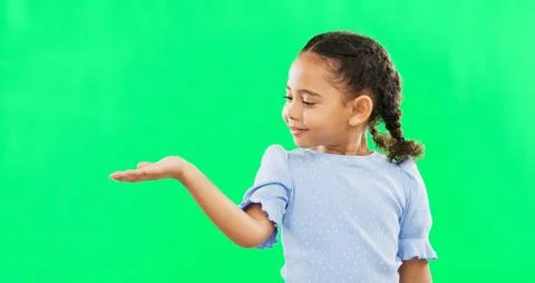 Green screen, hand gesture and child face of a young girl with mock up showing Stock Photos