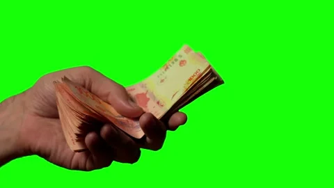 Green screen hand receiving Argentinian pesos Stock Footage 218005054