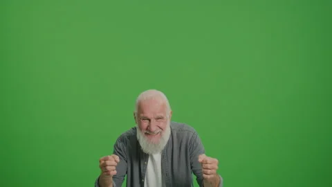 Green Screen. Happy Old Man Rejoices and Celebrates Victory Stock Footage 243473119