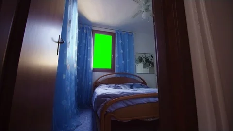 Green screen instead of the window in the bedroom Video stock 117705307