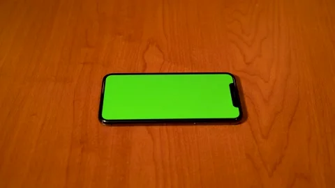 Green Screen Iphone X Mock Up On Table - Flat Video stock 147792263