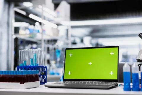 Green screen laptop in empty lab used by researchers to document clinical trial Fotos Stock
