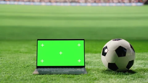 Green screen laptop mockup appears in a vertical stadium layout Stock Footage 337996267
