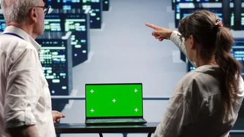 Green screen laptop servers fixing Stock Photos