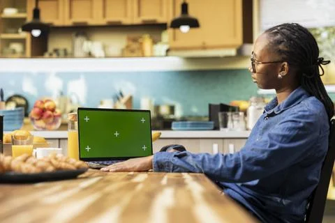 Green screen on laptop, solving daily tasks, wireless hybrid work Stock Photos